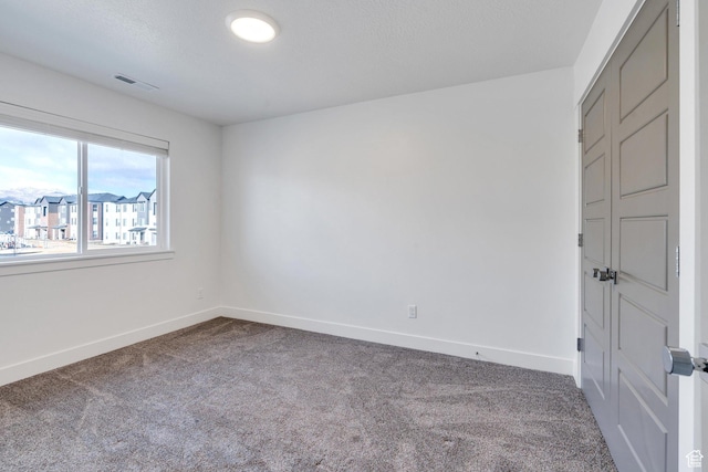 1455 N 3600 W, Lehi, UT 84043 - spare room with carpet and a textured ceiling