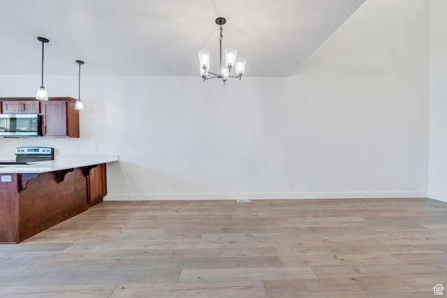 1455 N 3600 W, Lehi, UT 84043 - unfurnished dining area with a chandelier and light hardwood / wood-style floors