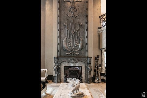 interior details with a premium fireplace