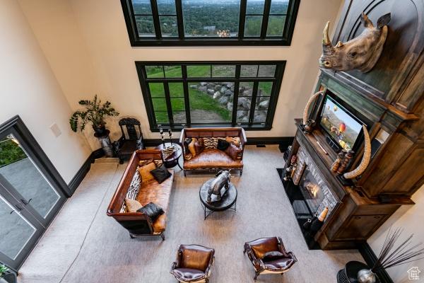 living room with a high ceiling