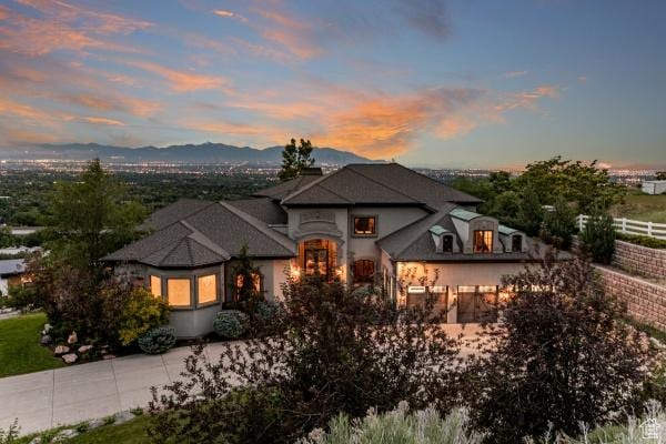 view of front of home featuring a mountain view