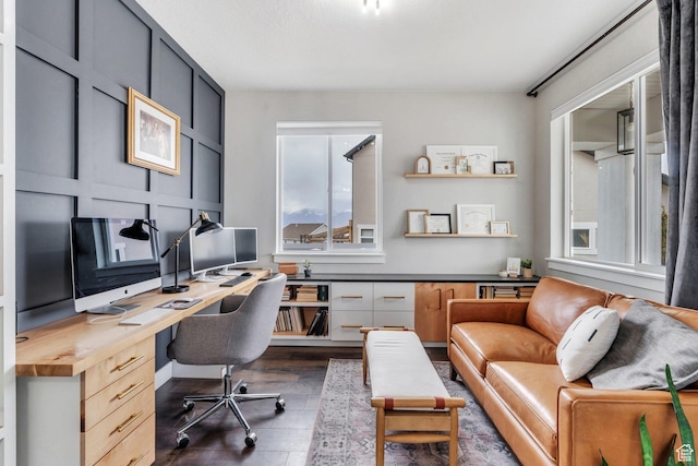 668 W Leroy Cir, Saratoga Springs, UT 84045 - office space featuring dark wood-style flooring and built in desk