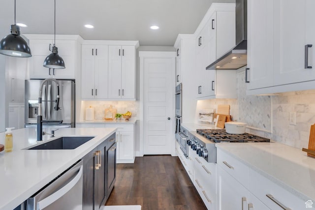 668 W Leroy Cir, Saratoga Springs, UT 84045 - kitchen featuring light countertops, a sink, stainless steel appliances, and wall chimney exhaust hood