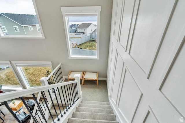 668 W Leroy Cir, Saratoga Springs, UT 84045 - stairs with baseboards and carpet flooring