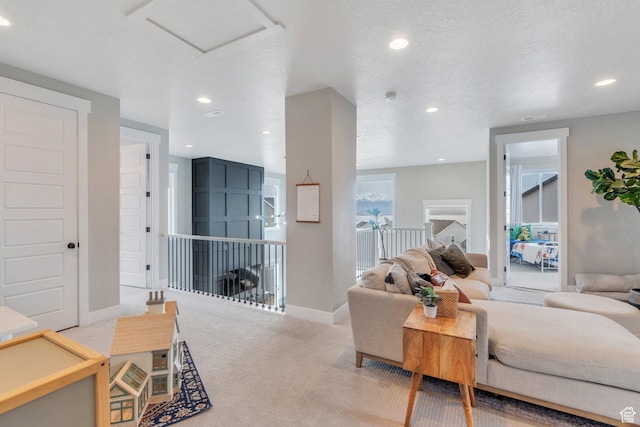 668 W Leroy Cir, Saratoga Springs, UT 84045 - living room featuring baseboards, recessed lighting, carpet, and attic access