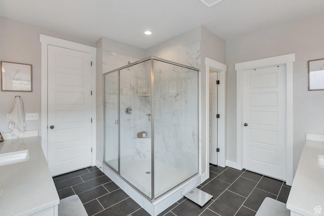 668 W Leroy Cir, Saratoga Springs, UT 84045 - bathroom featuring tile patterned floors, vanity, and a marble finish shower