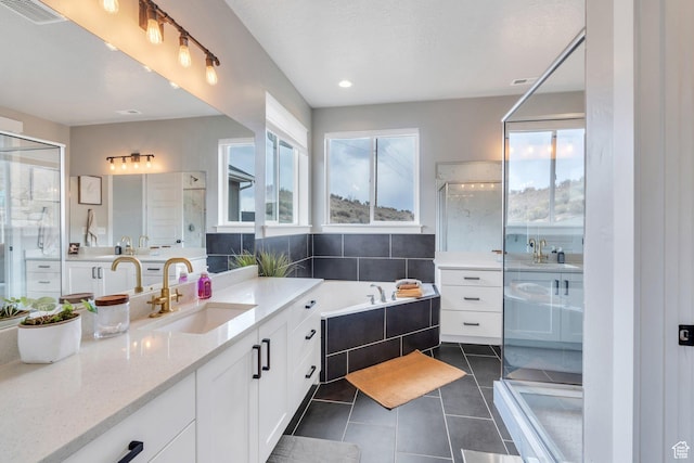 668 W Leroy Cir, Saratoga Springs, UT 84045 - full bath with visible vents, a bathtub, vanity, a shower with door, and tile patterned flooring