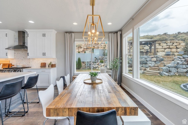 668 W Leroy Cir, Saratoga Springs, UT 84045 - dining room featuring dark wood finished floors, baseboards, a chandelier, and visible vents
