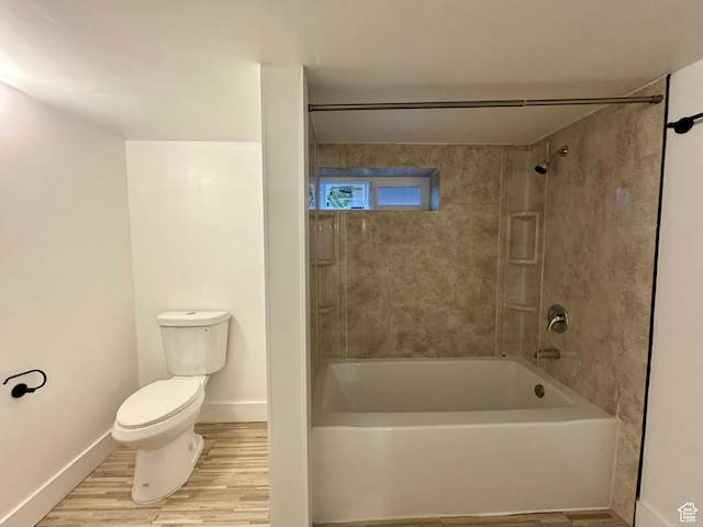 2721 Gramercy Ave, Ogden, UT 84403 - full bath with tub / shower combination, toilet, wood finished floors, and baseboards