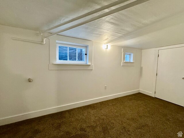 2721 Gramercy Ave, Ogden, UT 84403 - below grade area featuring baseboards and dark colored carpet