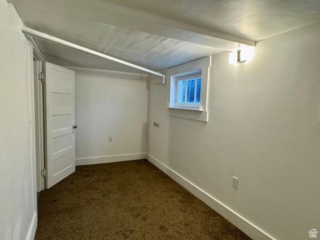 2721 Gramercy Ave, Ogden, UT 84403 - basement featuring baseboards and dark colored carpet