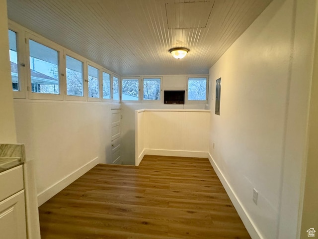 2721 Gramercy Ave, Ogden, UT 84403 - hallway with electric panel, wood ceiling, baseboards, and dark wood-style flooring