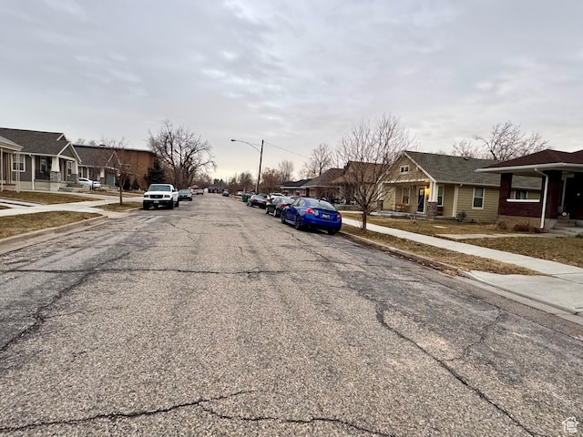 2721 Gramercy Ave, Ogden, UT 84403 - view of street with a residential view, curbs, street lights, and sidewalks