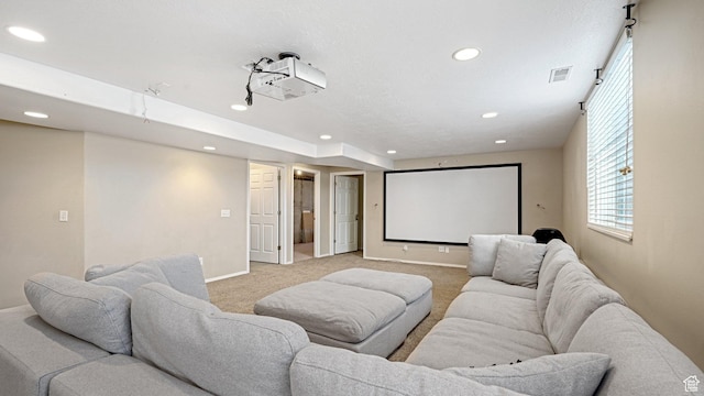 home theater featuring light colored carpet