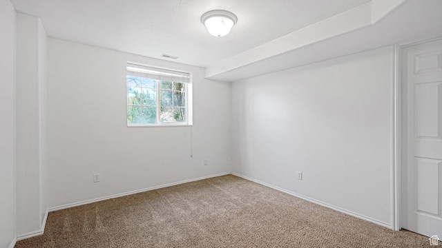 unfurnished room with carpet floors