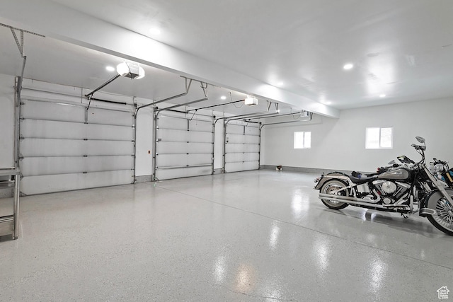 garage featuring a garage door opener