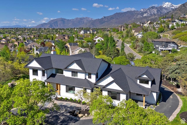 bird's eye view with a residential view and a mountain view