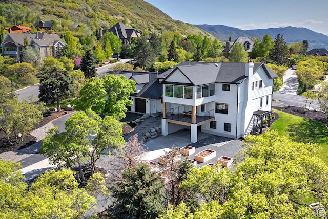 aerial view featuring a mountain view