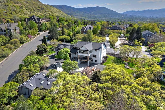 drone / aerial view with a mountain view and a residential view