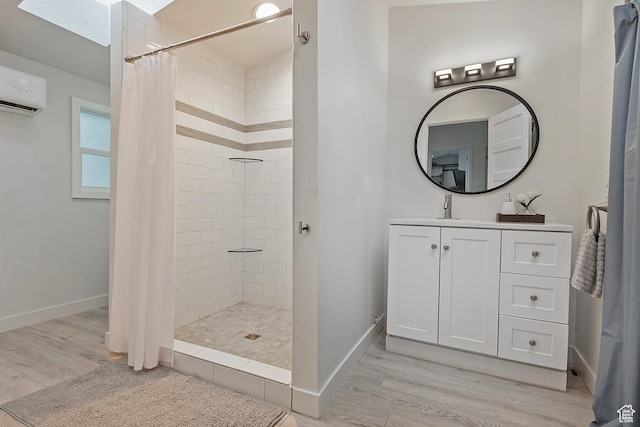 bathroom featuring a skylight, tiled shower, wood finished floors, and a wall mounted air conditioner