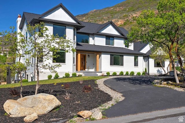 view of front of property with a mountain view