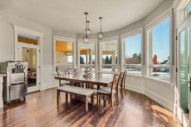 dining area featuring dark hardwood / wood-style flooring