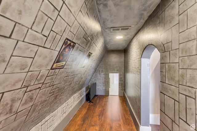 hallway featuring dark hardwood / wood-style flooring