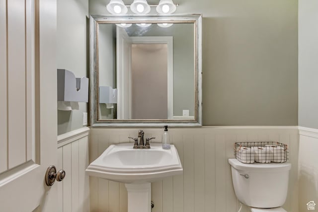 bathroom featuring toilet