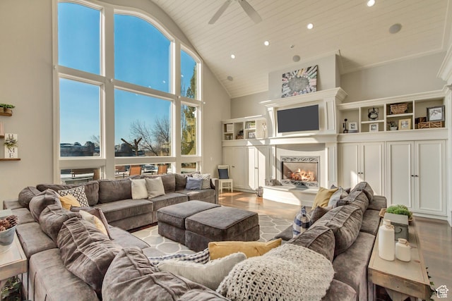 living room featuring ceiling fan, high vaulted ceiling, wood ceiling, and light hardwood / wood-style floors