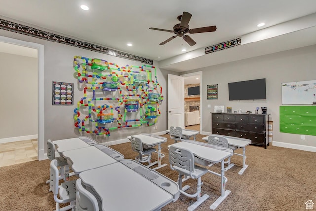 living room with carpet floors and ceiling fan