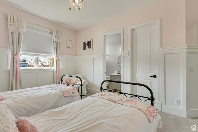 bedroom with light colored carpet