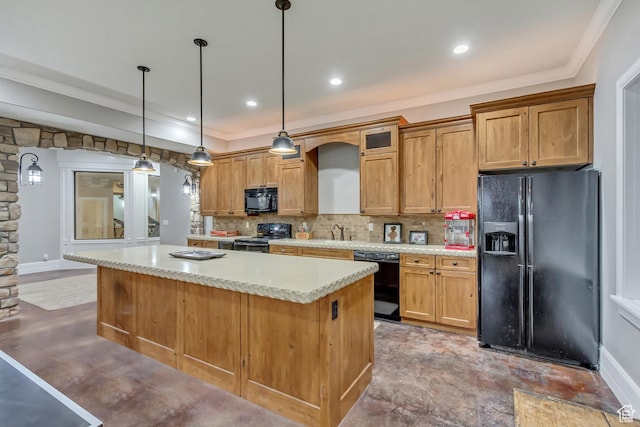 kitchen with sink, a center island, pendant lighting, decorative backsplash, and black appliances