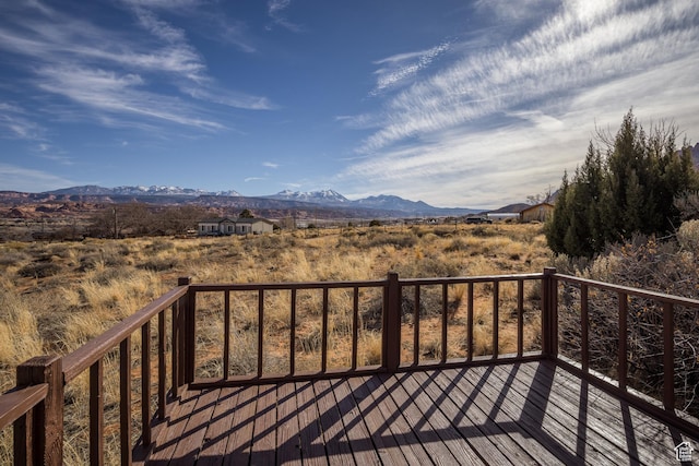 wooden terrace featuring a mountain view