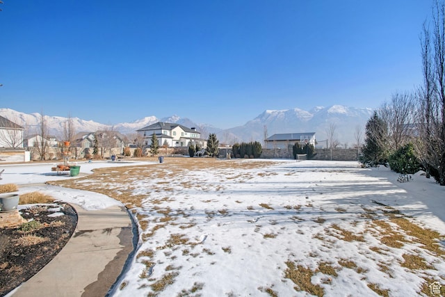 9632 N 5650 W, Highland, UT 84003 - snowy yard with a mountain view