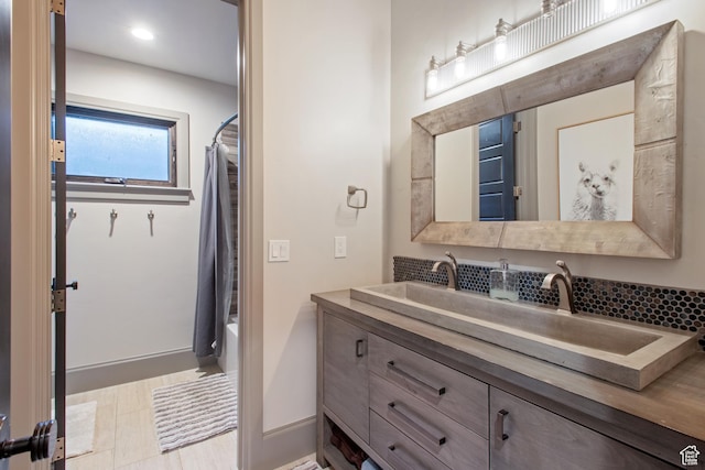 9632 N 5650 W, Highland, UT 84003 - bathroom featuring vanity and shower / tub combo with curtain