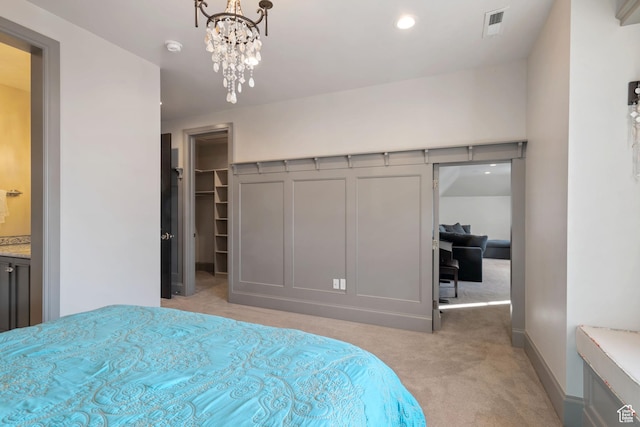 9632 N 5650 W, Highland, UT 84003 - carpeted bedroom with a notable chandelier and a walk in closet