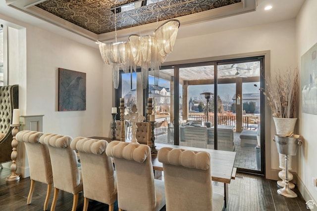 9632 N 5650 W, Highland, UT 84003 - dining space featuring a raised ceiling, dark wood-type flooring, and a chandelier