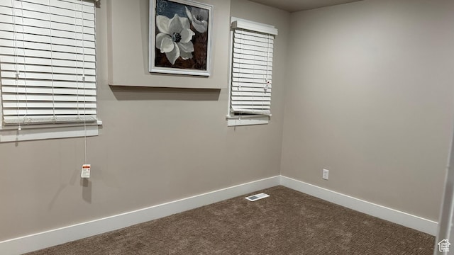 view of carpeted spare room