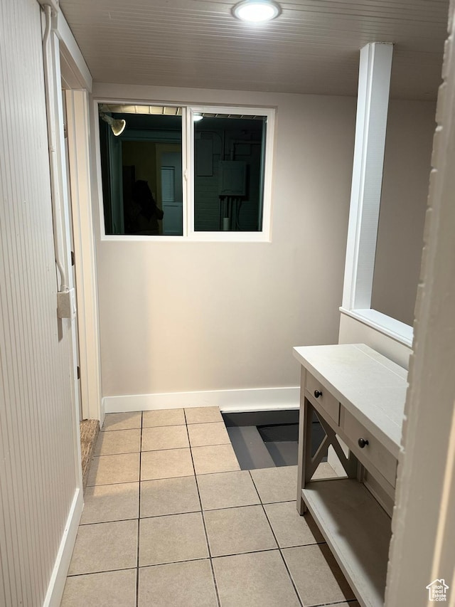 bathroom with tile patterned floors