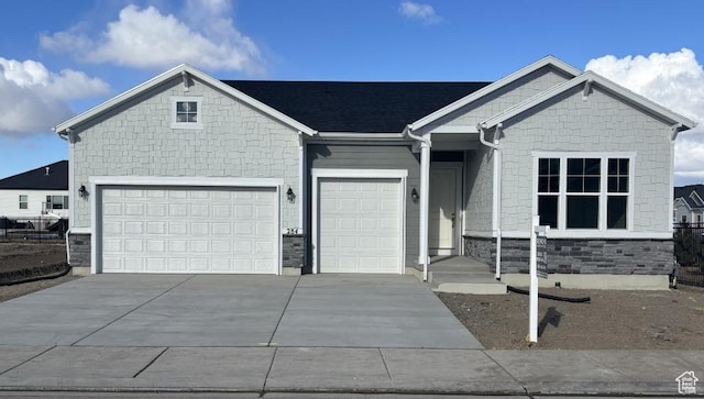 view of front of property with a garage