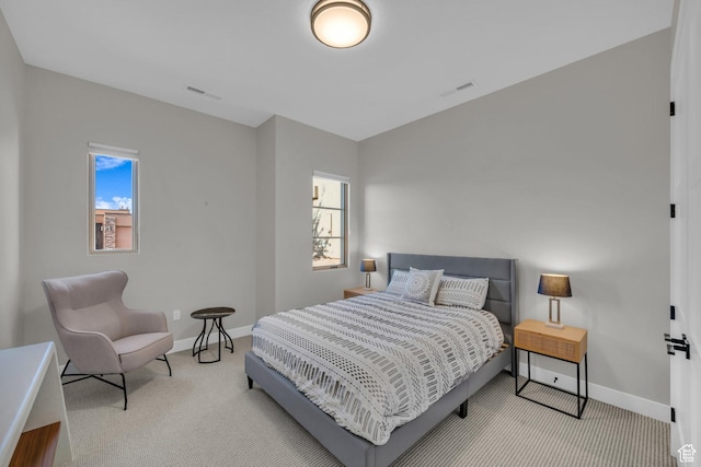 2090 N Tuweap Dr Unit 56, St George, UT 84770 - carpeted bedroom featuring multiple windows