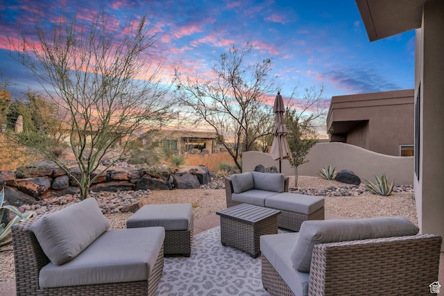 2090 N Tuweap Dr Unit 56, St George, UT 84770 - patio terrace at dusk featuring an outdoor living space