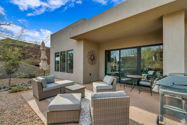 2090 N Tuweap Dr Unit 56, St George, UT 84770 - view of patio / terrace with a grill and outdoor lounge area