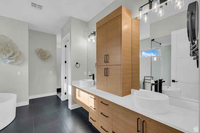 2090 N Tuweap Dr Unit 56, St George, UT 84770 - bathroom with tile patterned floors, vanity, and a bath