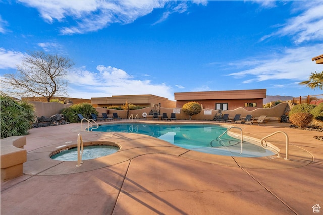 2090 N Tuweap Dr Unit 56, St George, UT 84770 - view of pool with a hot tub and a patio area