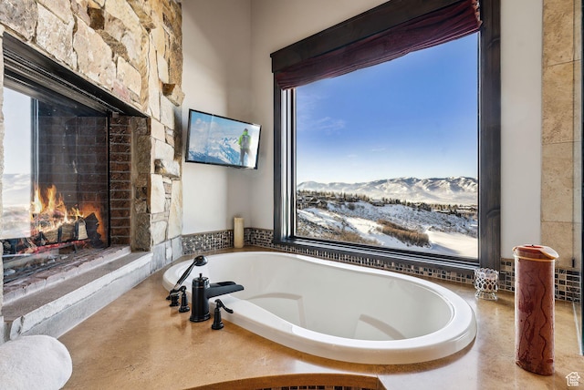 8435 N Ranch Garden Rd, Park City, UT 84098 - bathroom with a lit fireplace and a bathtub