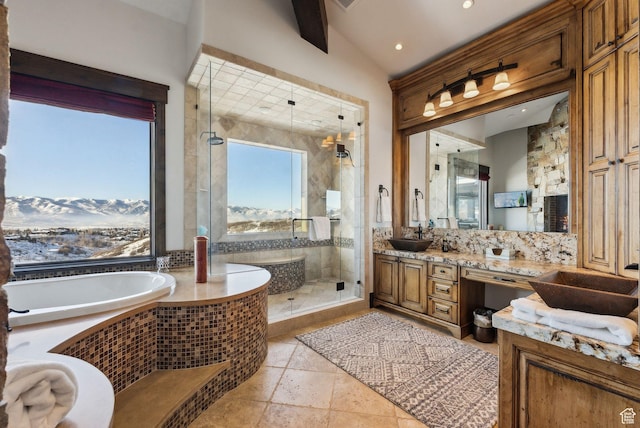 8435 N Ranch Garden Rd, Park City, UT 84098 - bathroom with a garden tub, a stall shower, vanity, a mountain view, and vaulted ceiling