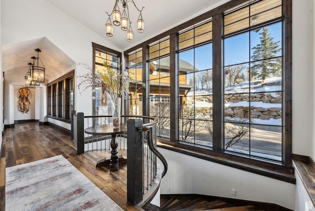 8435 N Ranch Garden Rd, Park City, UT 84098 - entrance foyer with a chandelier, vaulted ceiling, baseboards, and hardwood / wood-style flooring