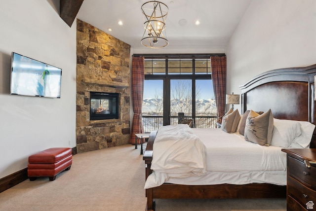 8435 N Ranch Garden Rd, Park City, UT 84098 - bedroom with carpet flooring, access to exterior, a chandelier, a fireplace, and baseboards
