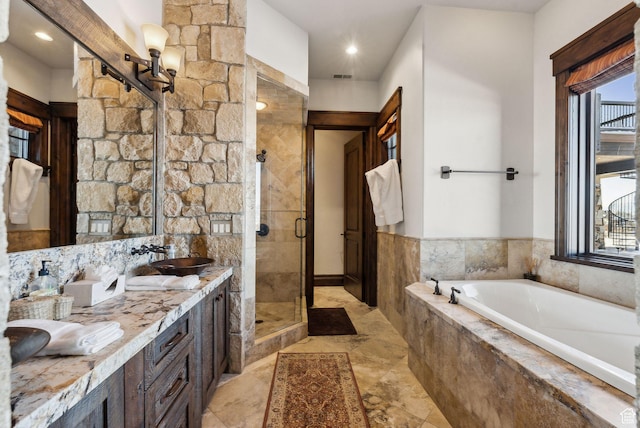 8435 N Ranch Garden Rd, Park City, UT 84098 - full bathroom featuring a shower stall, a garden tub, double vanity, and recessed lighting
